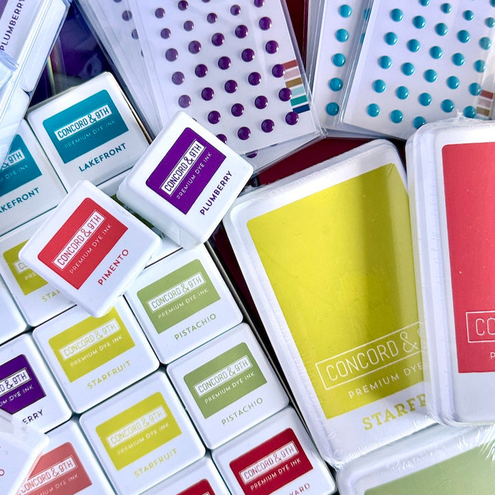 Collection of Concord & 9th dye inks and enamel dots in various colors.