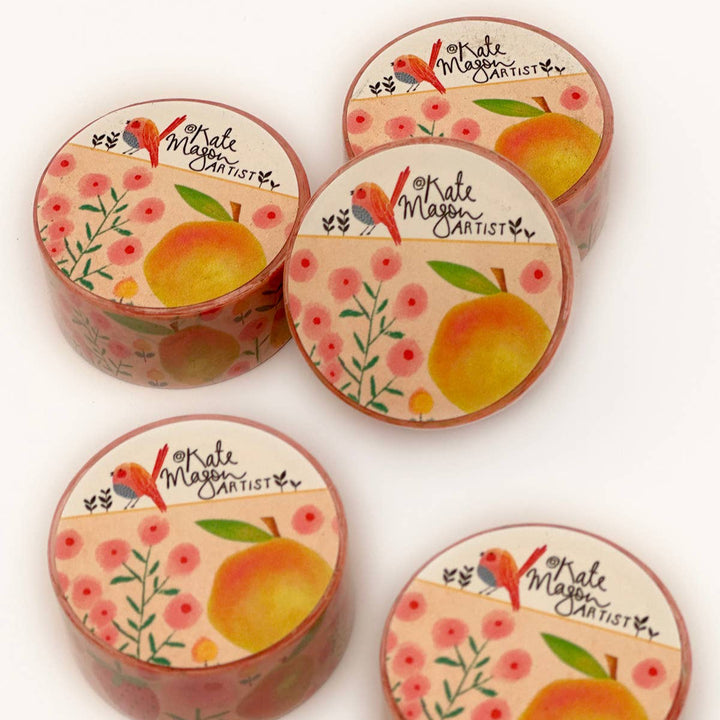 Five washi tapes with floral and fruit design on a white background from above