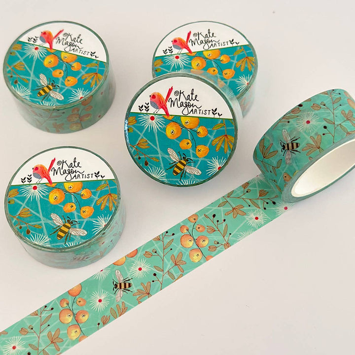 Set of washi tape rolls with packaging floral and bee design on a white background