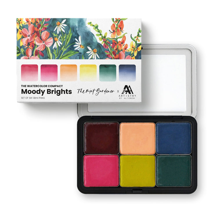 Watercolor compact palette with 'Moody Brights' colors and floral packaging.