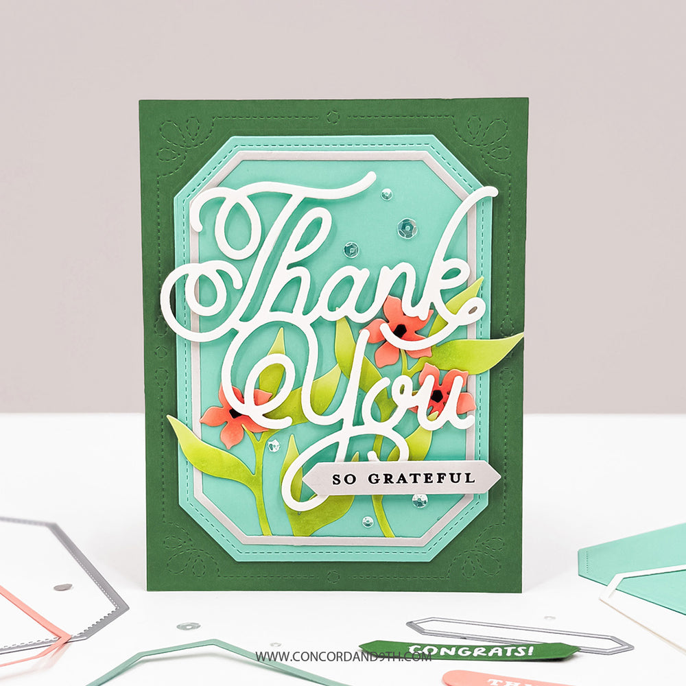 A card made with the Concord & 9th Essential Labels & Frames Dies: a large white 'Thank You' with coral flowers on a mint label and a 'so grateful' tag.
