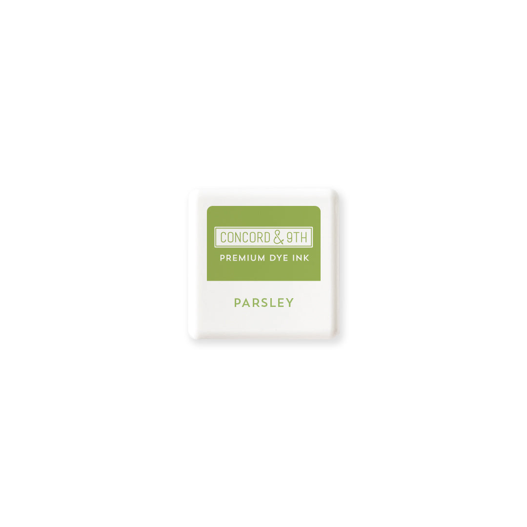 Concord & 9th premium dye mini ink cube in parsley colour on a white background