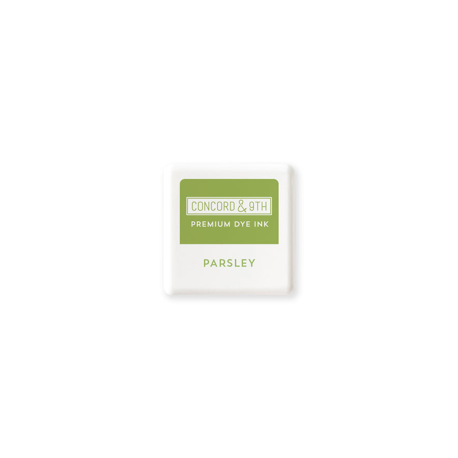 Concord & 9th premium dye mini ink cube in parsley colour on a white background