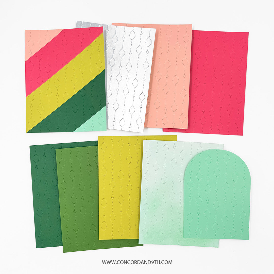 Concord & 9th Chandelier Card Front Die — individual die-cut panels in an assortment of solid colours, each embossed with the die's repeating chandelier bead pattern.