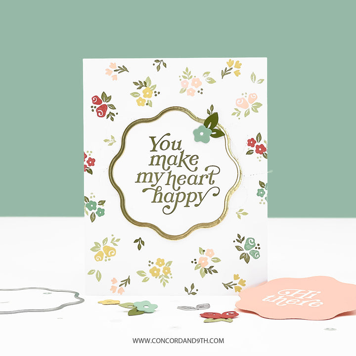 Greeting card with floral design and text 'You make my heart happy' on a light green background.