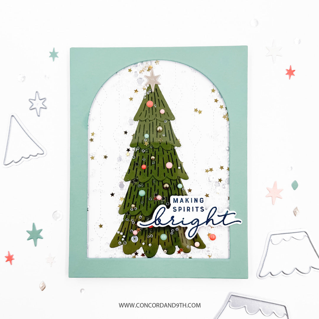 Concord & 9th Holiday Home Dies — the decorated tree die layered inside a sequin shaker dome, with a "Making Spirits Bright" sentiment.