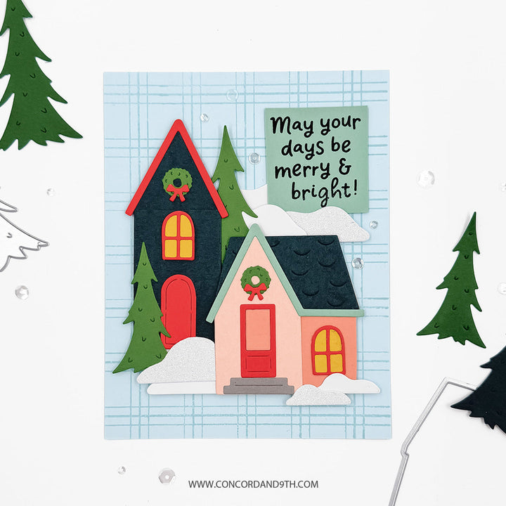 Concord & 9th North Pole Greetings Dies — the cottage scene die on a plaid background, with a "May your days be merry & bright" sentiment.