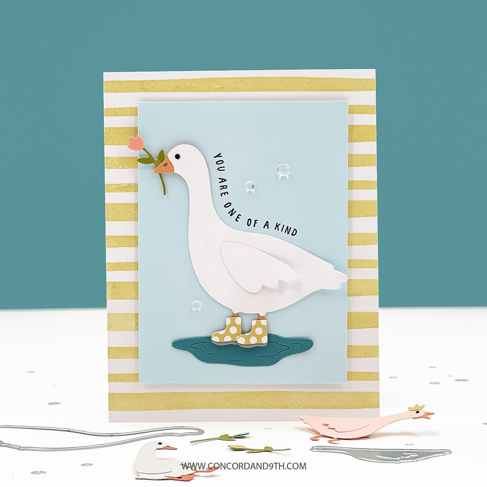 Card with a goose illustration and text on a striped border