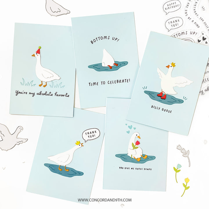 Collection of greeting cards with cartoon ducks on a light blue background