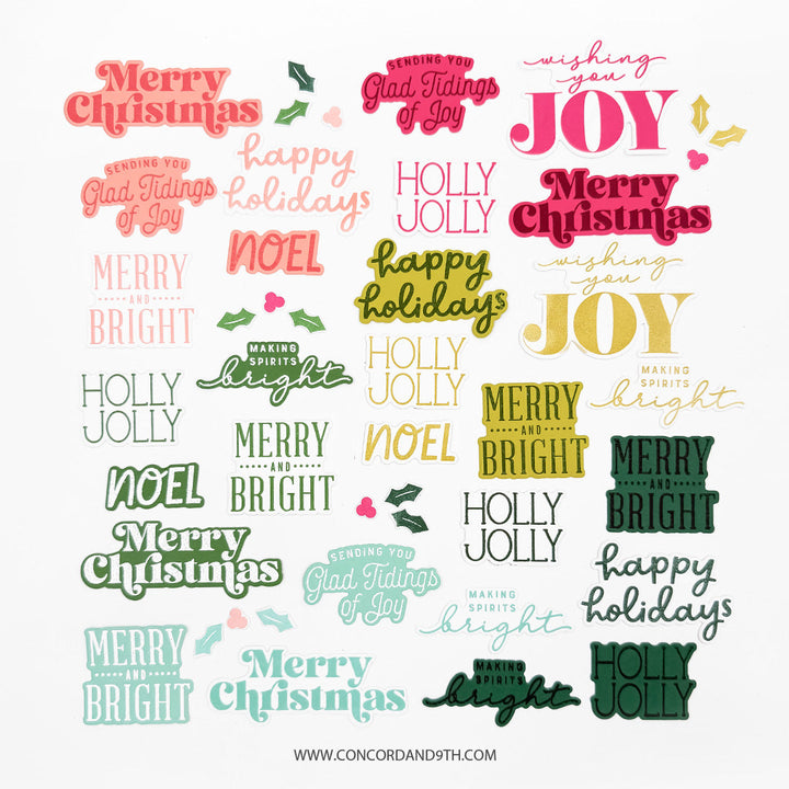 Concord & 9th Tidings of Joy Dies — the full set of word-art die-cuts in multiple colourways, including "Merry Christmas," "Glad Tidings of Joy," "Holly Jolly," "Noel," "Merry and Bright," and "Making Spirits Bright."