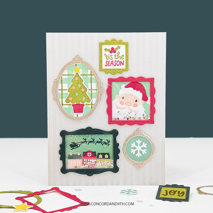 Concord & 9th Very Merry Gallery Dies — a striped gallery-wall card with five framed vignettes: a "tis the Season" tag, a Santa face shaker, an oval Christmas tree, a sleigh-over-village shaker, and a snowflake circle.