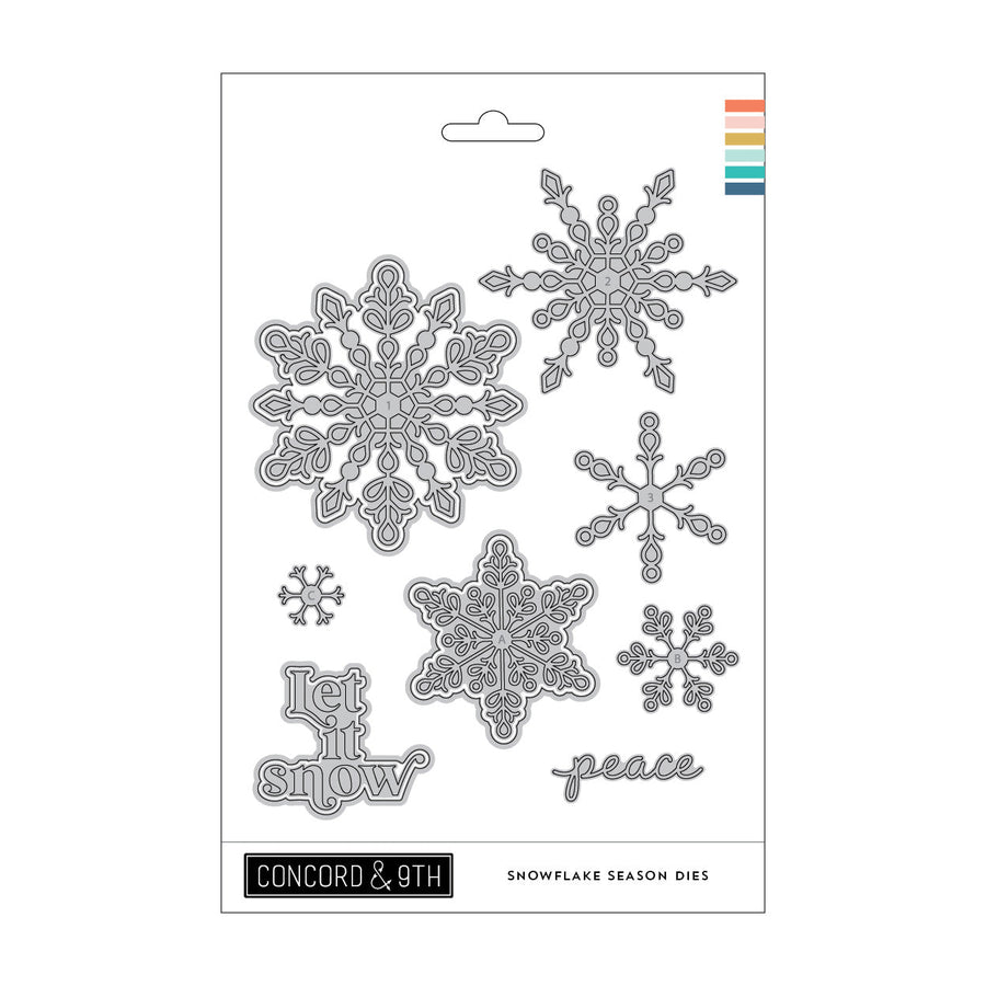Concord & 9th Snowflake Season Dies — a set of intricately detailed snowflakes in several sizes, plus "Let it snow" and "peace" word dies.