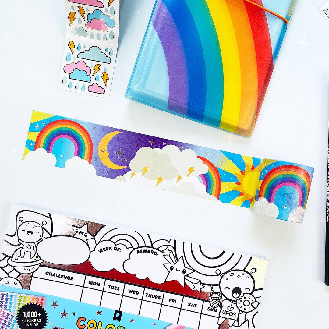 Rainbow and sunshine Washi tape flat lay with other stationary items around