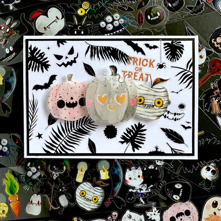Halloween card made with PET tape stickers on a black background 