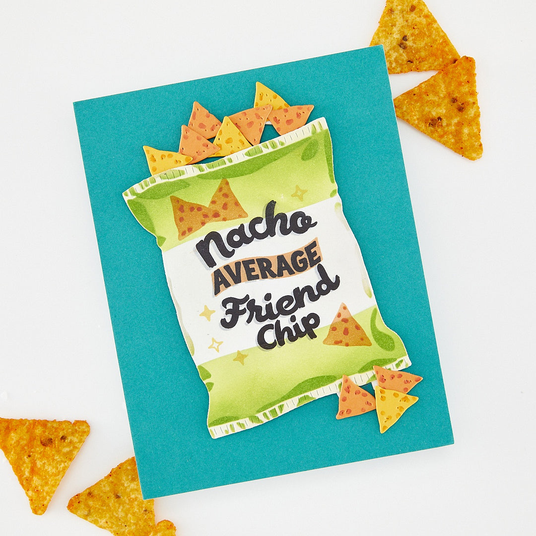 Card with a green bag of chips design and 'Nacho Average Friend Chip' text, surrounded by actual tortilla chips on a white background.