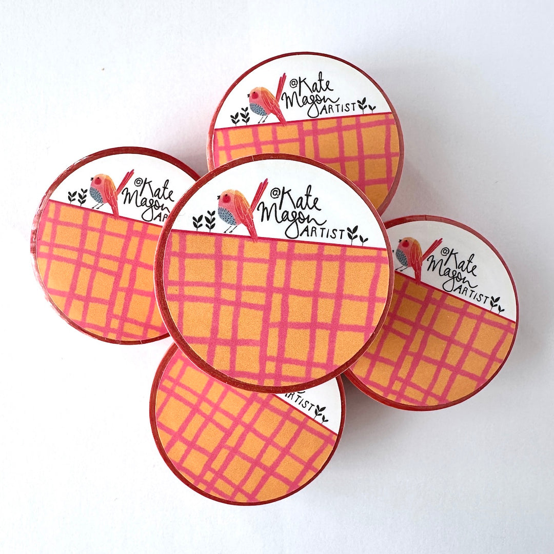 Five Washi tapes with a pink and orange plaid pattern and a white logo section featuring a small bird illustration and the text 'Kate Morgan Artist', arranged on a plain white background.