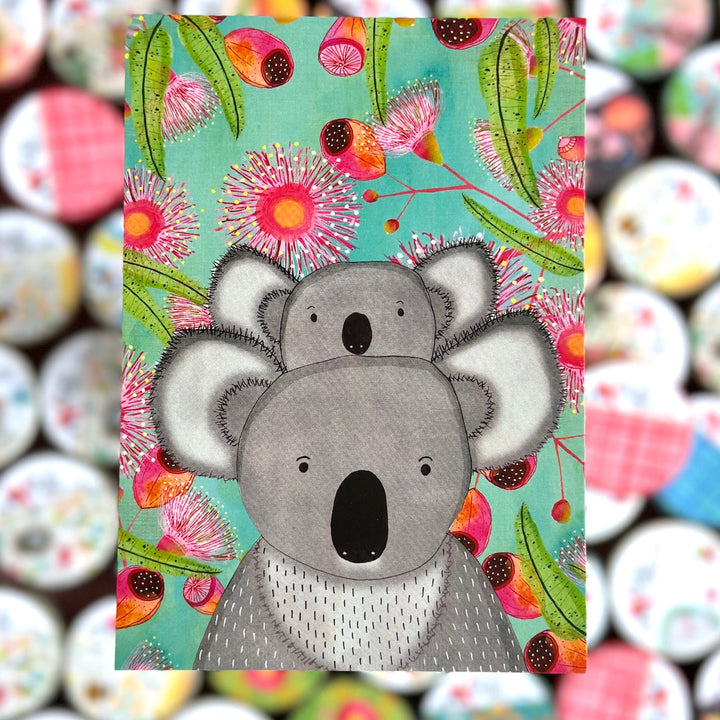 Illustration of two koalas on a colorful floral background with a blurred patterned background.
