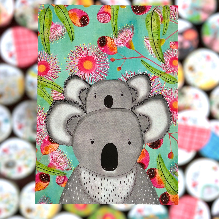 Illustration of two koalas on a colorful floral background with a blurred patterned background.