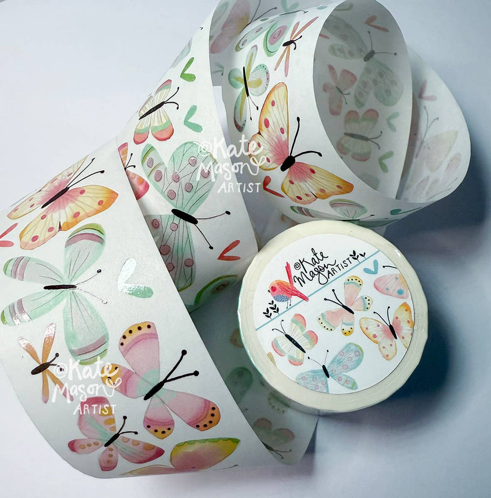 Butterfly-themed tape rolls with Kate Mason Packaging on light background