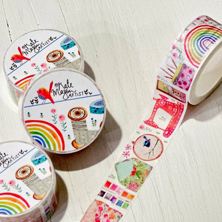Decorative tape with colorful crafty designs on a light wooden surface