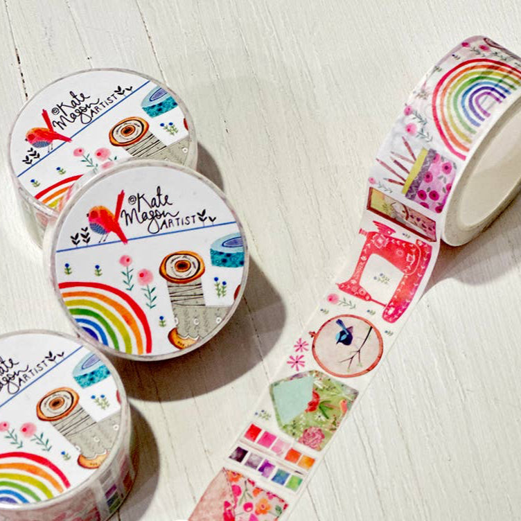 Decorative tape with colorful crafty designs on a light wooden surface