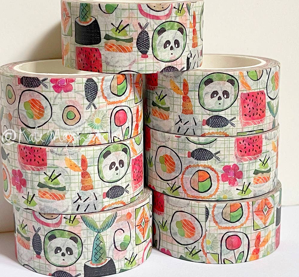 Set of colorful washi tape rolls with panda and sushi designs on a white background