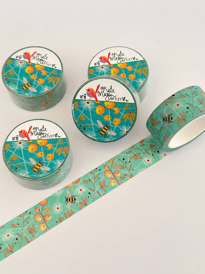 Set of washi tape rolls with packaging floral and bee design on a white background