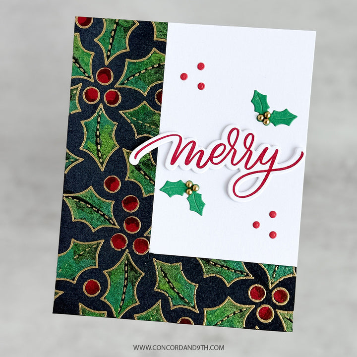 A card made with Kristina Werner's Merry Script Dies: gold-embossed holly and red berries with 'merry' in red script and small holly leaves.