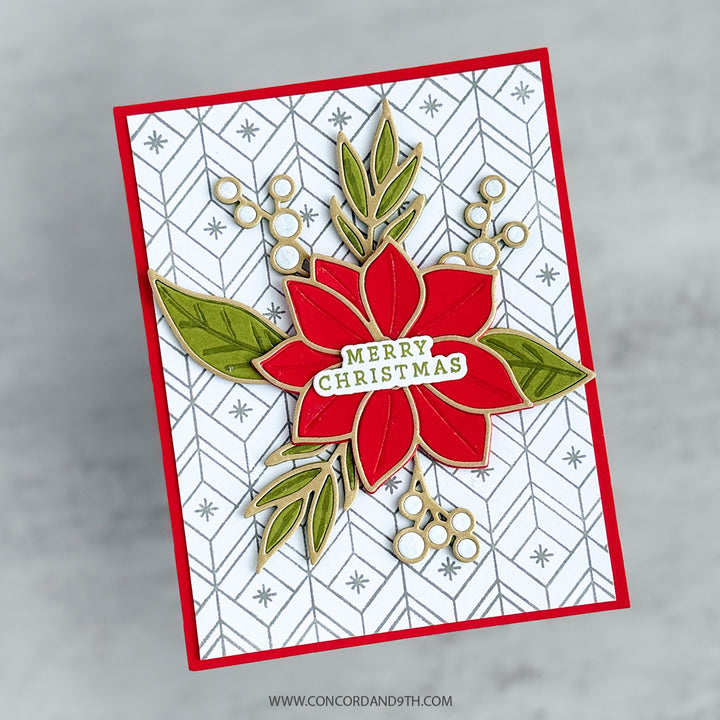 A card made with Kristina Werner's Poinsettia Inlay Dies: a layered red poinsettia with leaves, berries and 'Merry Christmas' on a silver patterned background.