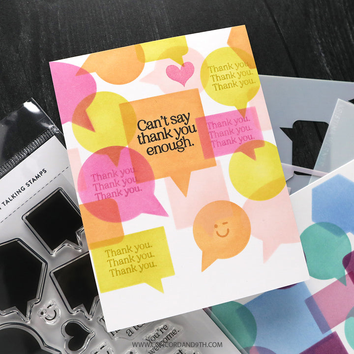 Colorful card with 'Thank you' text and speech bubbles, surrounded by stamping tools.