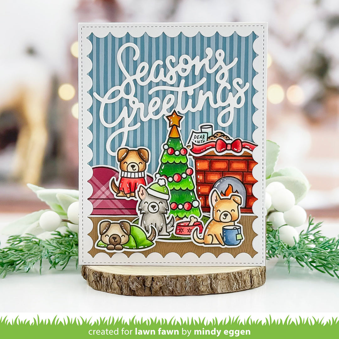 Lawn Fawn Cozy Dogs Season's Greetings card with puppies by a Christmas tree and brick fireplace, by Mindy Eggen