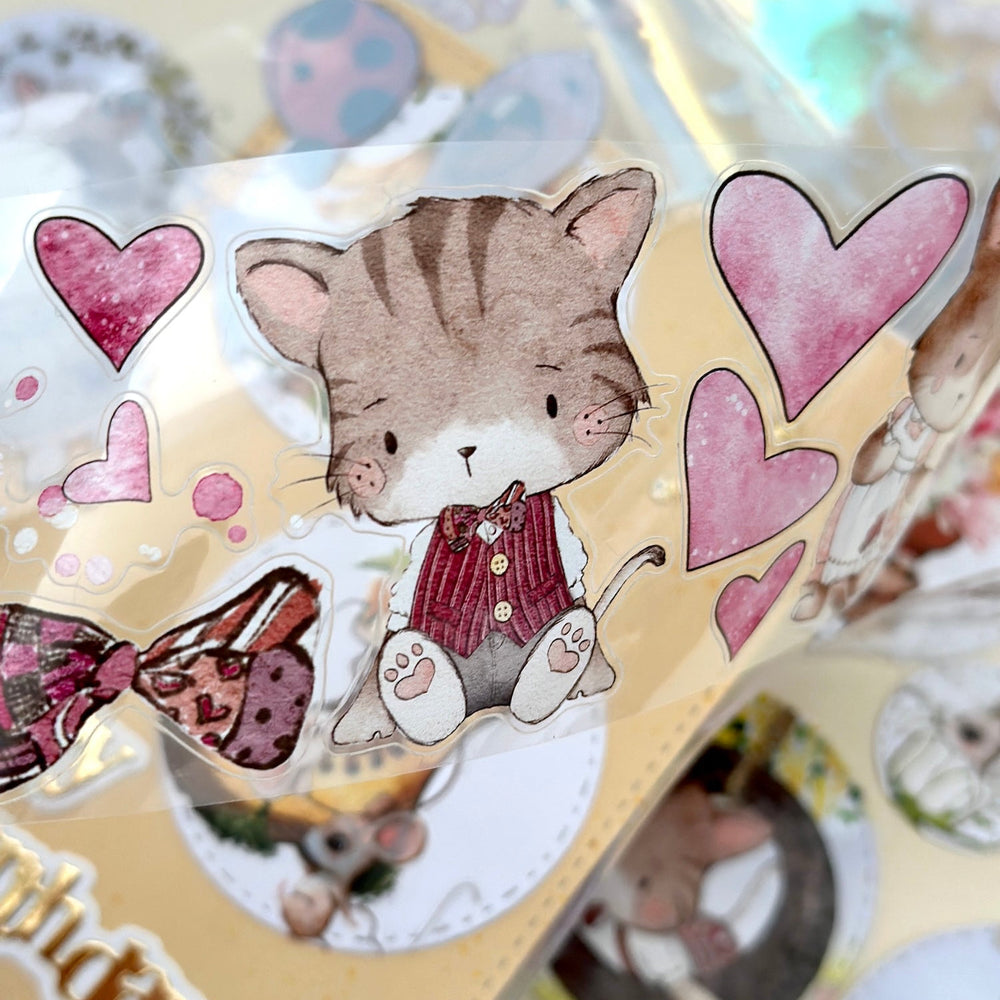 Sticker sheet with a cat and heart designs on a beige background