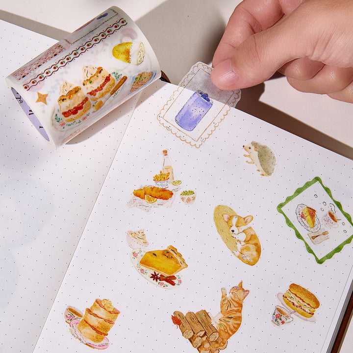 Hand peeling a pre-cut piece from The Washi Tape Shop Autumn Pantry Wide Washi/PET Tape onto a journal page