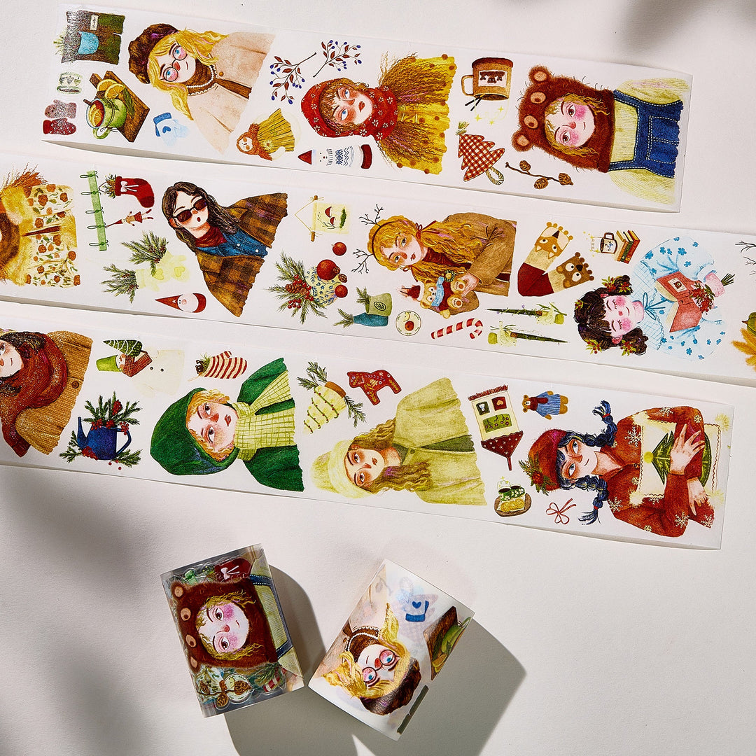 Strips of The Washi Tape Shop Holly Belle Wide Washi/PET Tape laid flat with the rolls, showing the full design