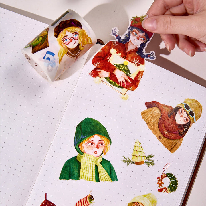 Hand peeling a pre-cut piece from The Washi Tape Shop Holly Belle Wide Washi/PET Tape onto a journal page