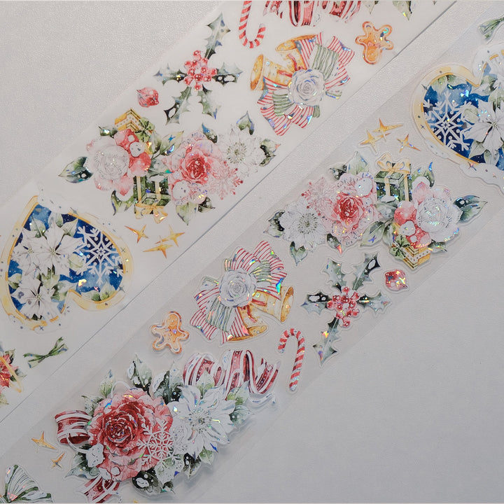 Strips of The Washi Tape Shop Holly Bloom Wide Washi/PET Tape laid flat with the rolls, showing the full design