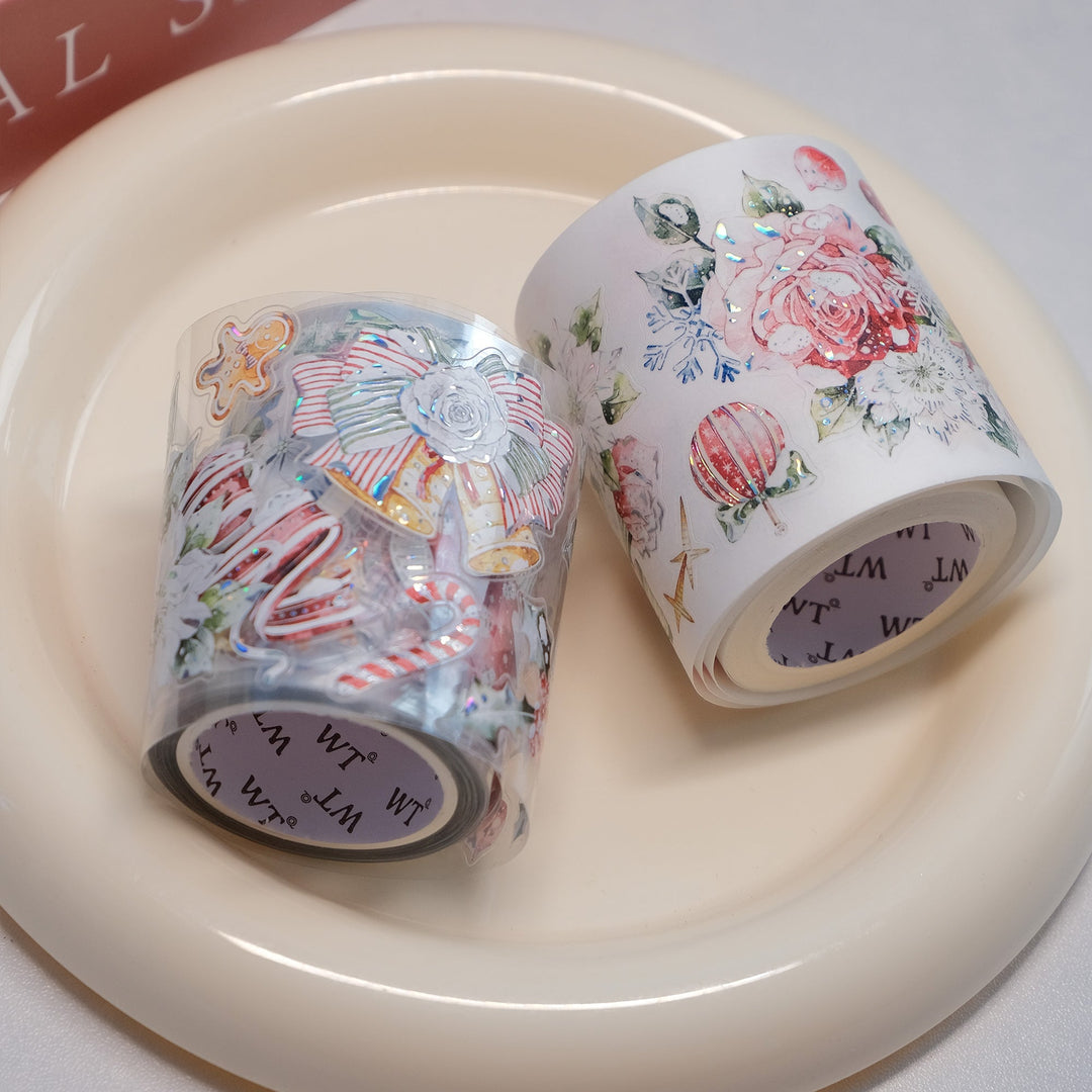 Two rolls of The Washi Tape Shop Holly Bloom Wide Washi/PET Tape sitting in a cream dish