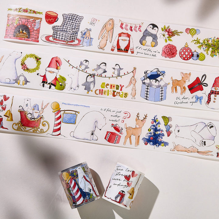 Strips of The Washi Tape Shop Polar Pals Wide Washi/PET Tape laid flat with the rolls, showing the full design
