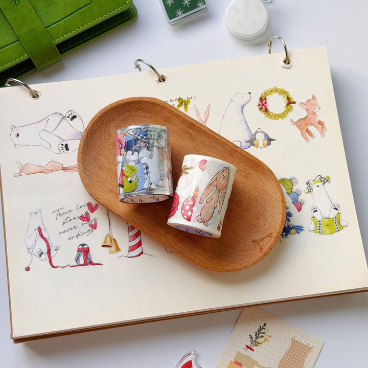 Journal decorated with The Washi Tape Shop Polar Pals Wide Washi/PET Tape with the rolls resting on the page