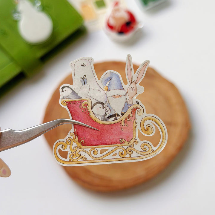Tweezers lifting a pre-cut piece from The Washi Tape Shop Polar Pals Wide Washi/PET Tape