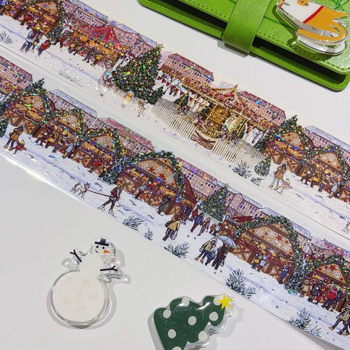 Strips of The Washi Tape Shop Yuletide Glow Wide Washi/PET Tape beside the washi and PET rolls