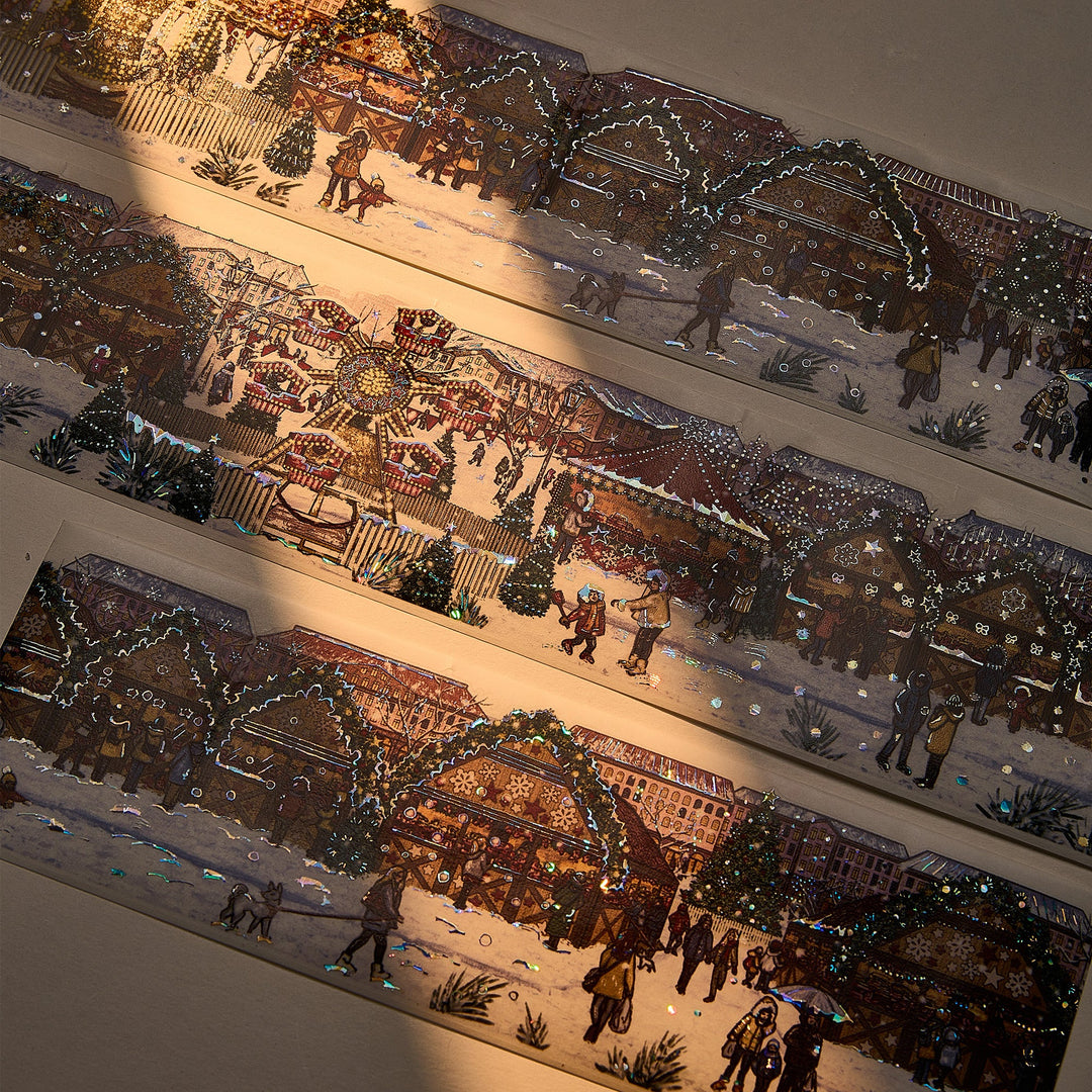 The Washi Tape Shop Yuletide Glow Wide Washi/PET Tape laid out in warm sunlight, showing the seashell gilded Christmas market