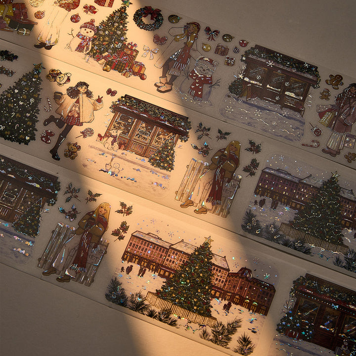 The Washi Tape Shop Yuletide Village Wide Washi/PET Tape laid out in warm sunlight, showing the seashell gilded rooftops and fairy lights