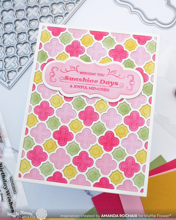 Card with floral pattern and 'Wishing You Sunshine Days & Joyful Memories' text, surrounded by crafting tools.
