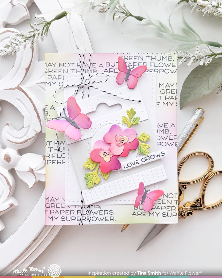 Card with floral design and butterflies on a decorative background