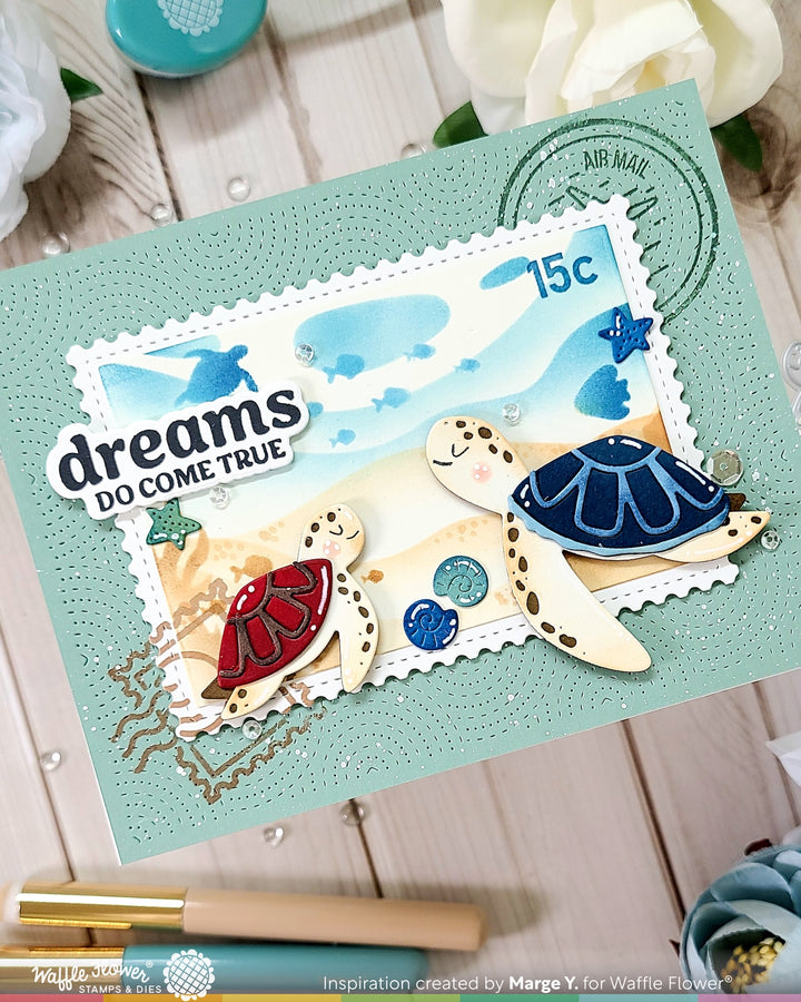 Handmade greeting card with turtle design and 'dreams do come true' text on a light blue background