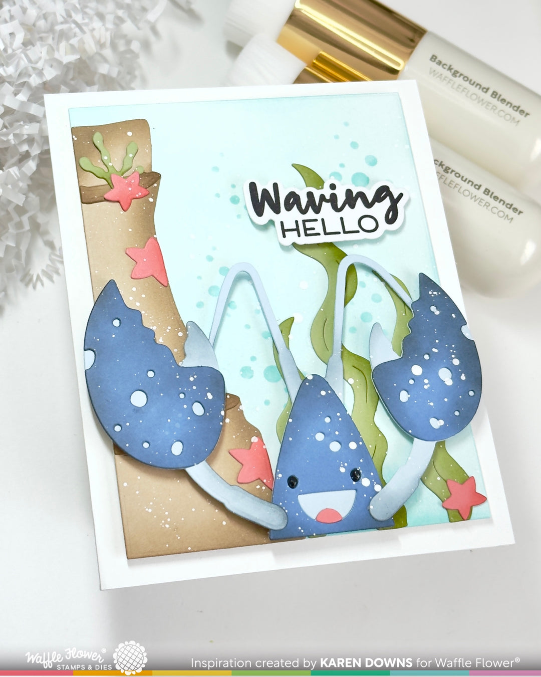 Card with blue lobster waving and text 'Waving Hello' on a white background