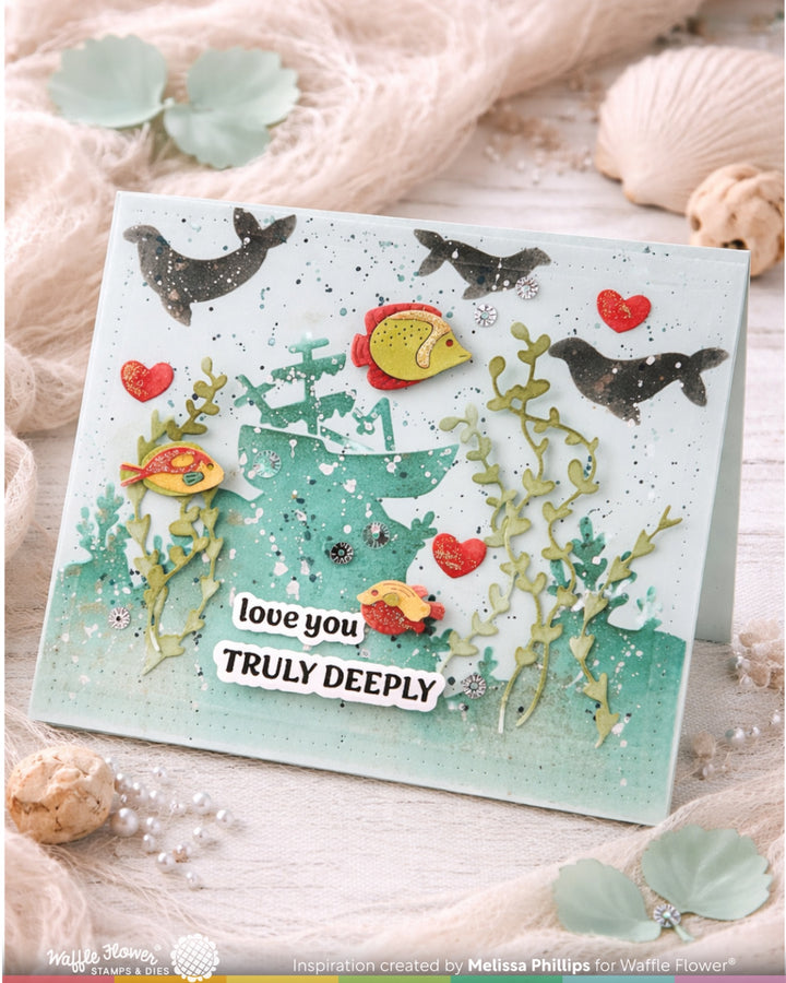 Card with underwater scene design, fish, and text 'love you TRULY DEEPLY' on a light background.