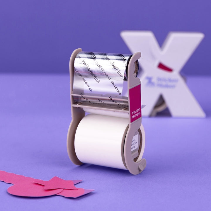 Xyron 150 refill permanent on purple background
