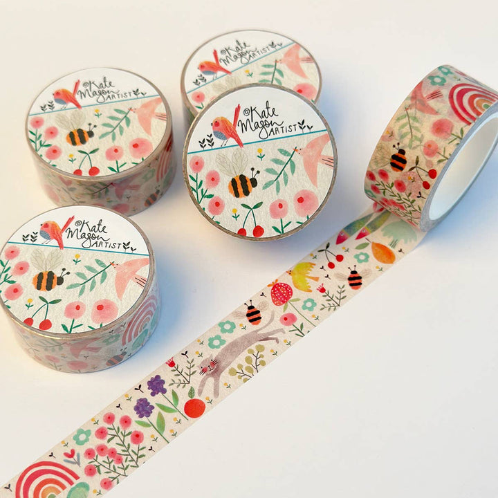 Decorative washi tape rolls with floral and nature-themed designs on a white background.